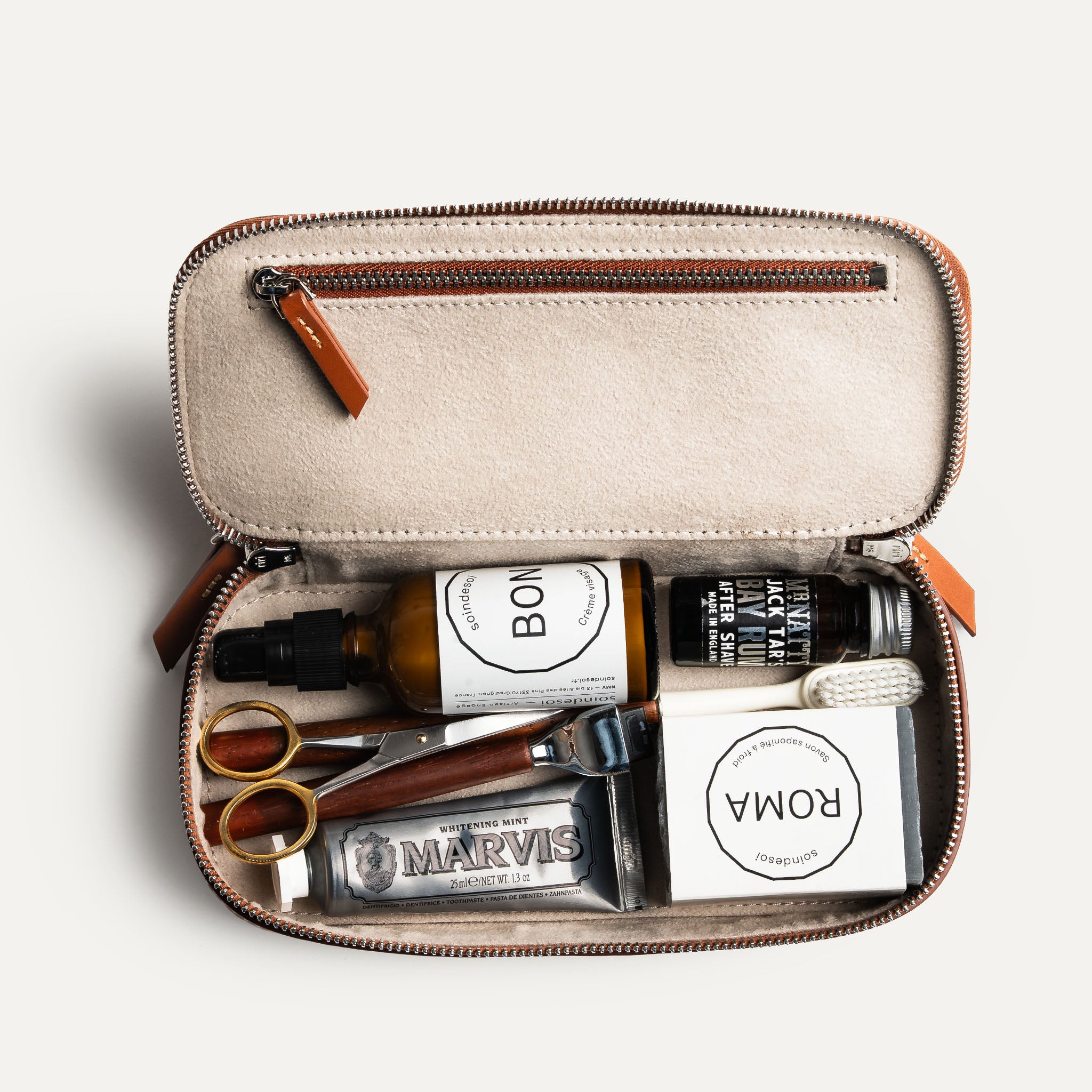 Trousse de toilette lundi en cuir cognac