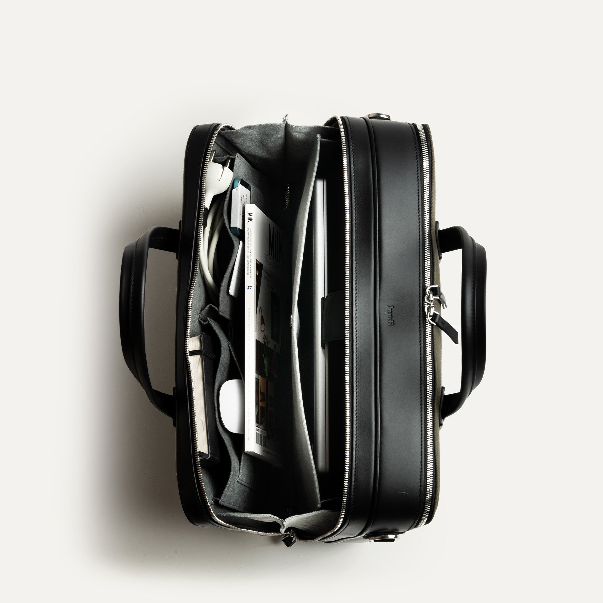 sac ordinateur CONALLY conçu pour transporter un ordinateur jusqu’à 17 pouces et tous les outils de travail.