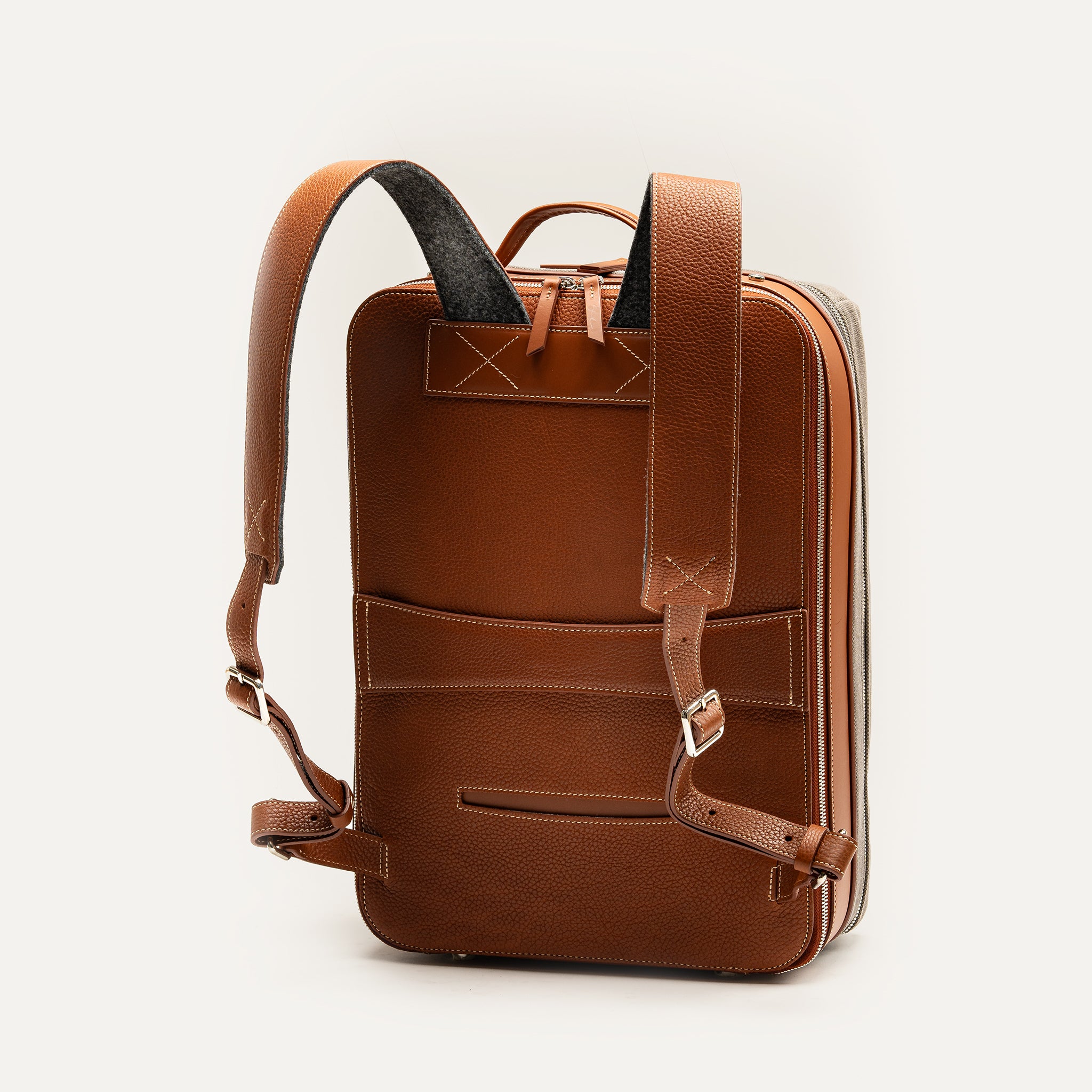 Sac à dos business homme en cuir et toile déperlante avec un passant trolley intégré