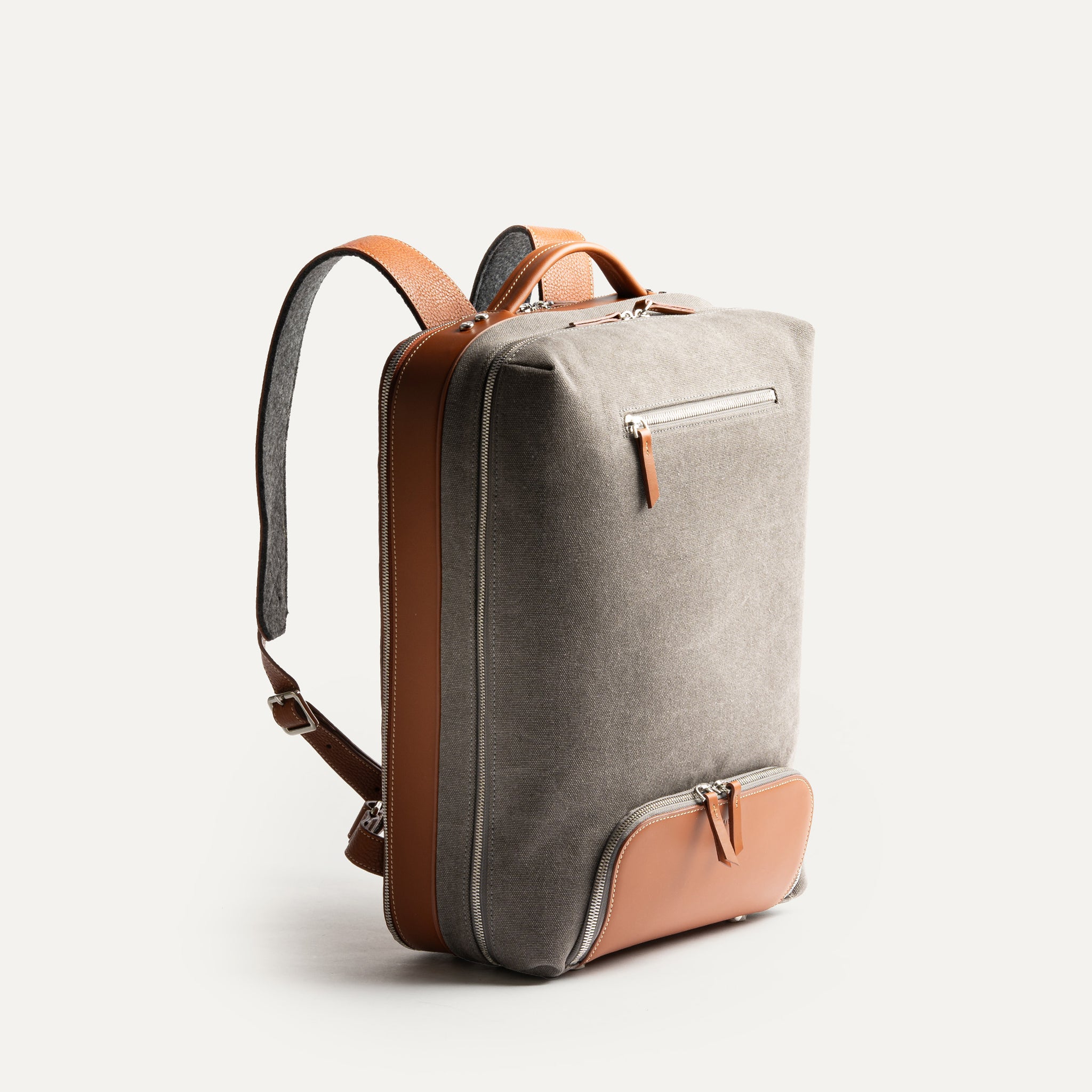 sac à dos business homme en cuir cognac et toile déperlante.