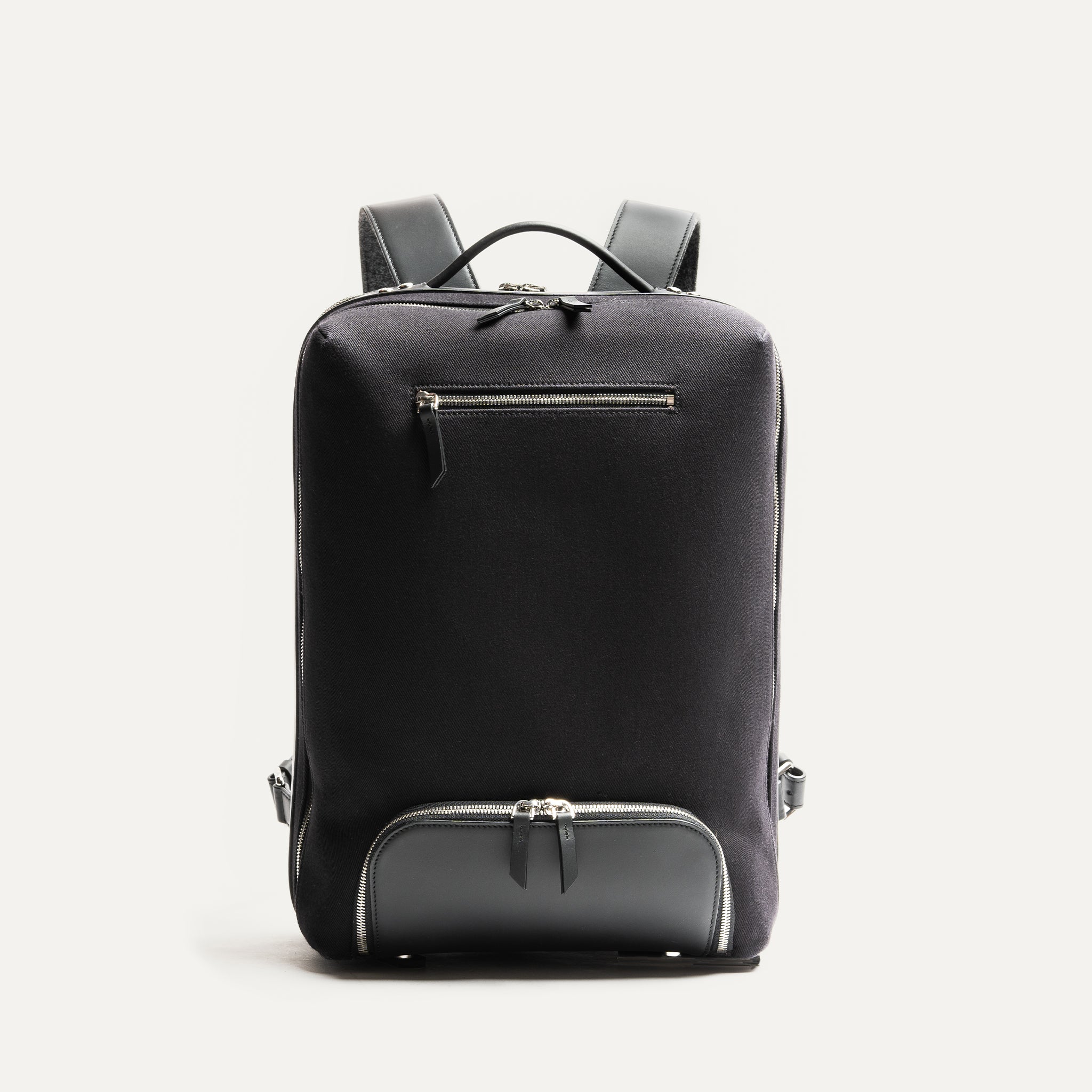 Meilleur sac à dos urbain homme au design épuré et minimaliste, avec une toile 100% coton résistant à l'eau