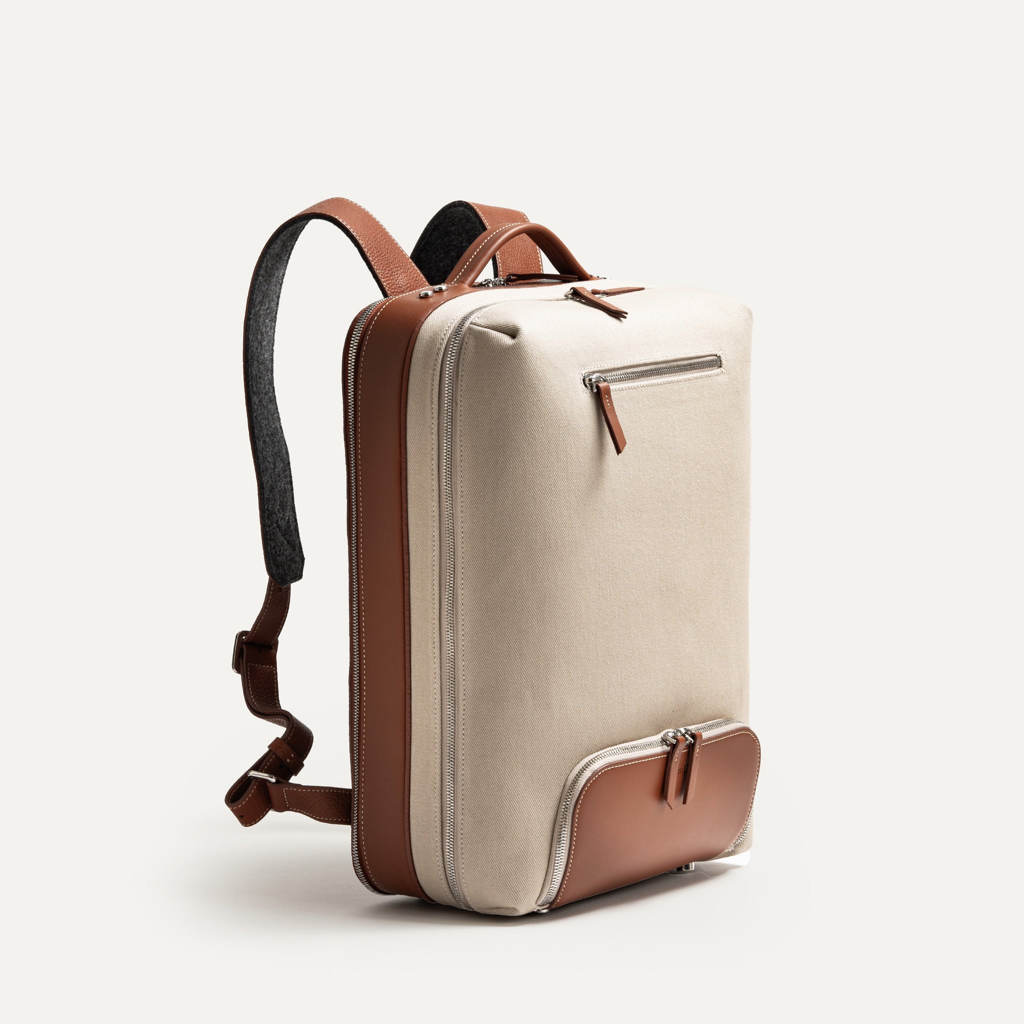 Sac à dos homme cuir et toile sable, design minimaliste et compact pour week-end ou travail