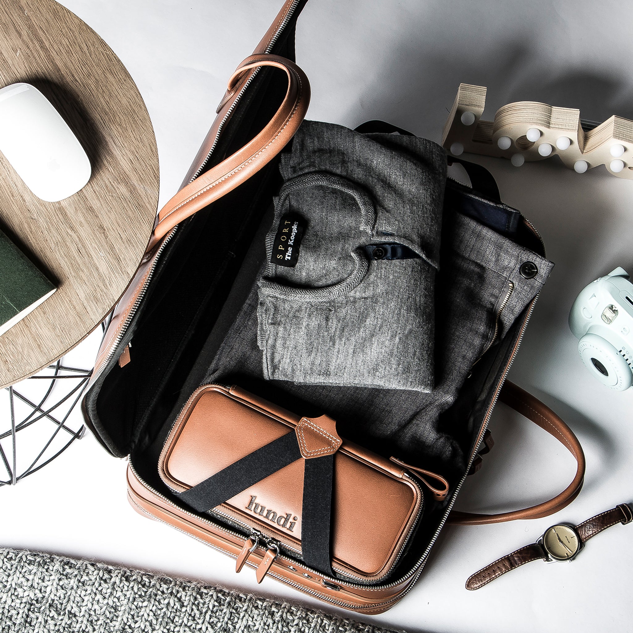 Sac à main homme pratique avec compartiment dressing et office.
