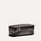 Trousse de toilette de voyage vue de l’arrière avec anse latérale, idéale pour transporter les essentiels lors des déplacements.