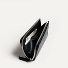 Portefeuille cuir femme ou homme avec rangement billets et monnaie, gousset intérieur.