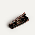 Porte monnaie femme en cuir cognac, fermeture zip et poche centrale pour pièces
