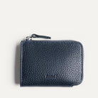 Leather wallet in navy blue for men and women, compact and elegant design.
