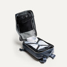 Sac à dos de voyage avec rangements organisés, parfait pour emporter vêtements et dossiers