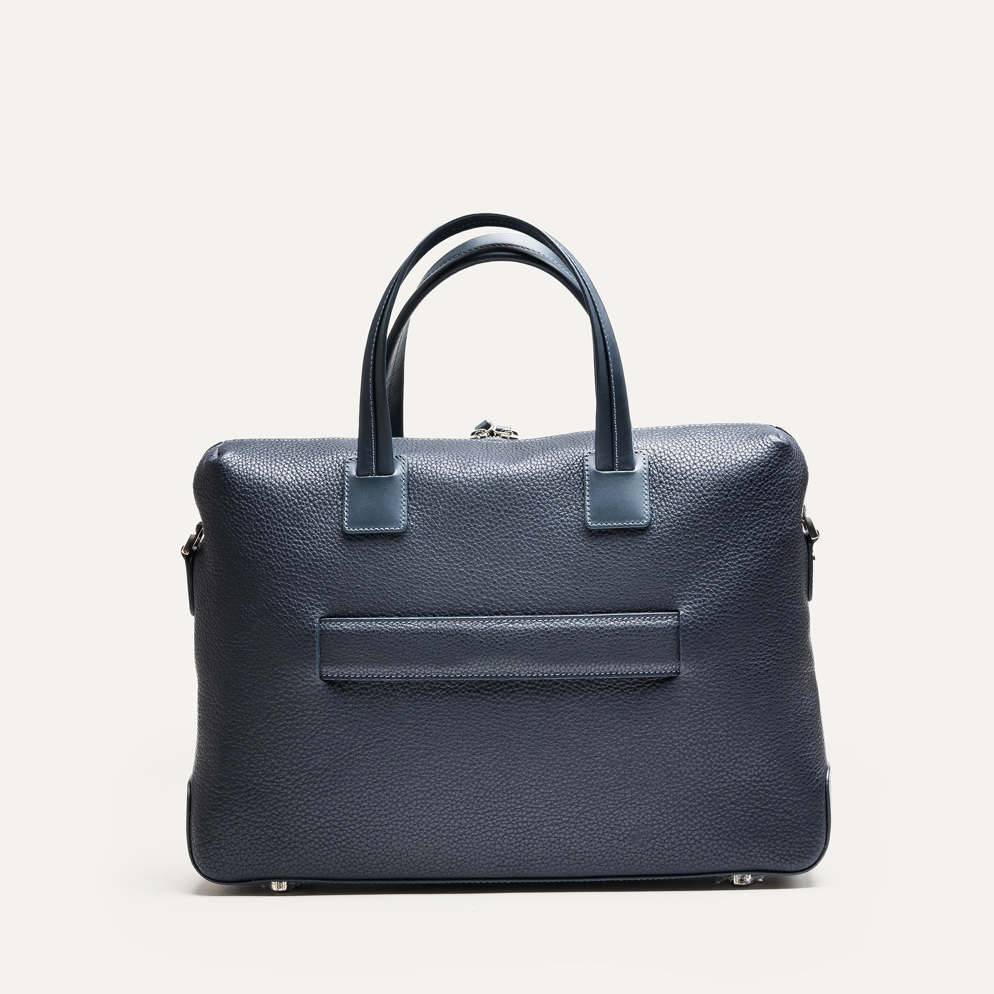 Cartable cuir homme avec passant pour valise, anses robustes et design structuré.