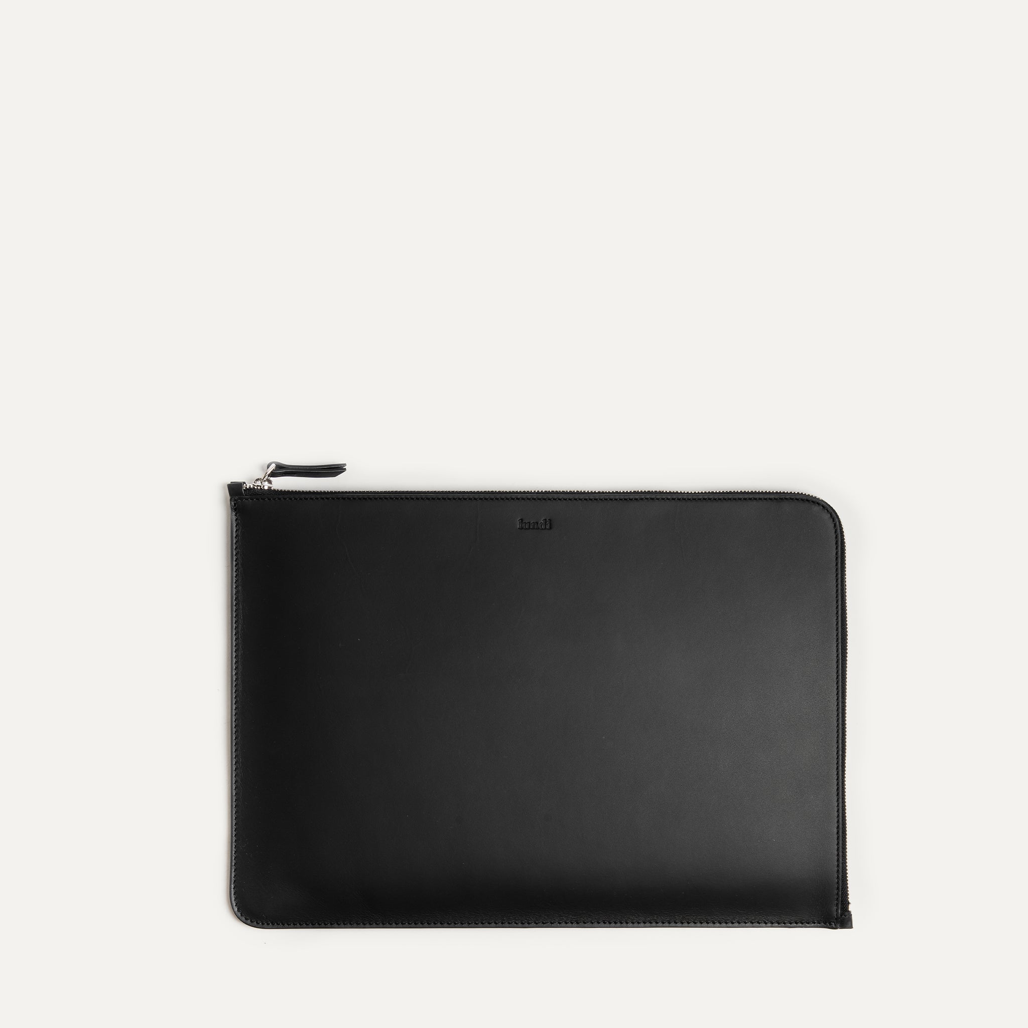 Pochette ordinateur cuir noire pour Mac, design minimaliste et élégant.