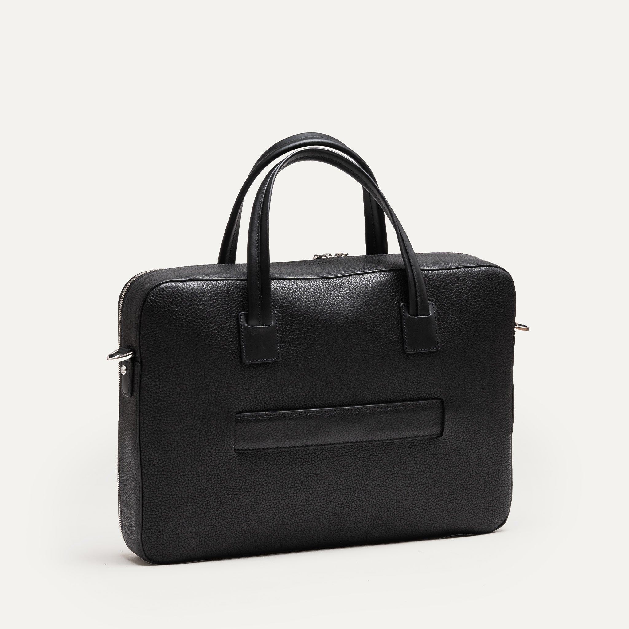 Vue arrière d’un sac homme travail avec poignées renforcées et passant pour trolley signé lundi.