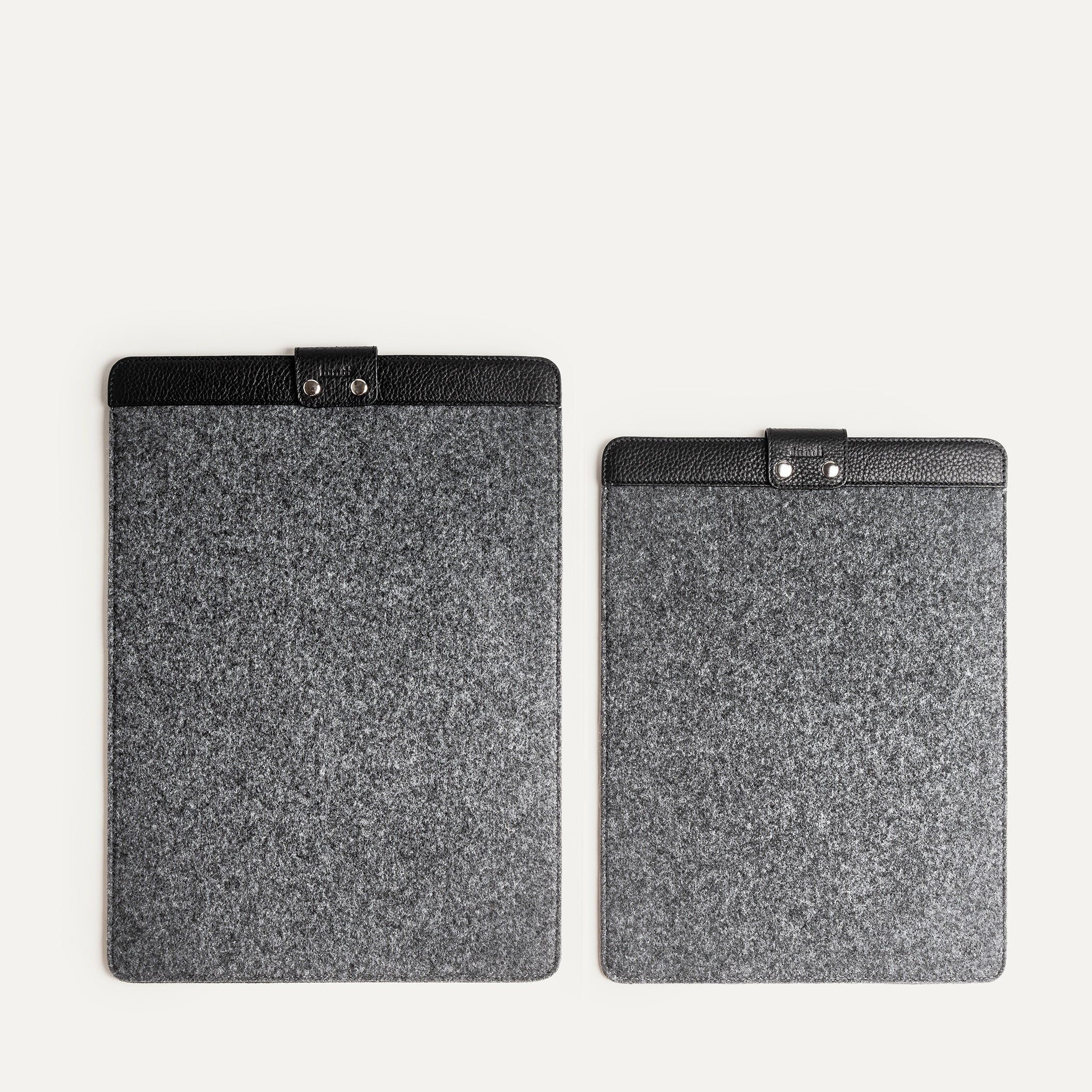 Laptop sleeves in two sizes, felt and leather design for Mac computers