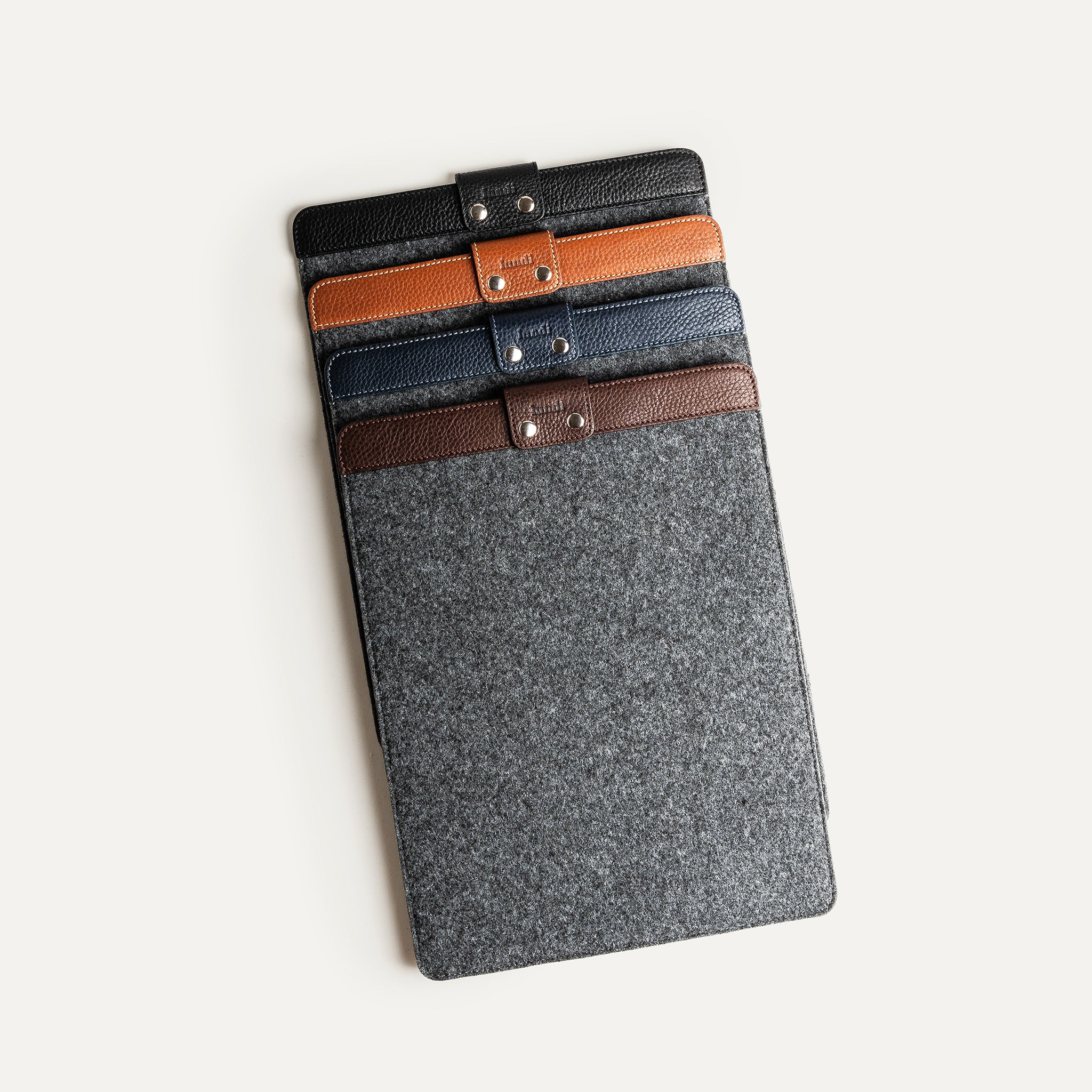 Leather laptop sleeves in multiple colors, computer sleeves for Mac in 14 and 16 inch format.
