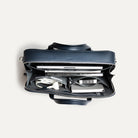 Sac ordinateur avec poche matelassé en cuir marine.