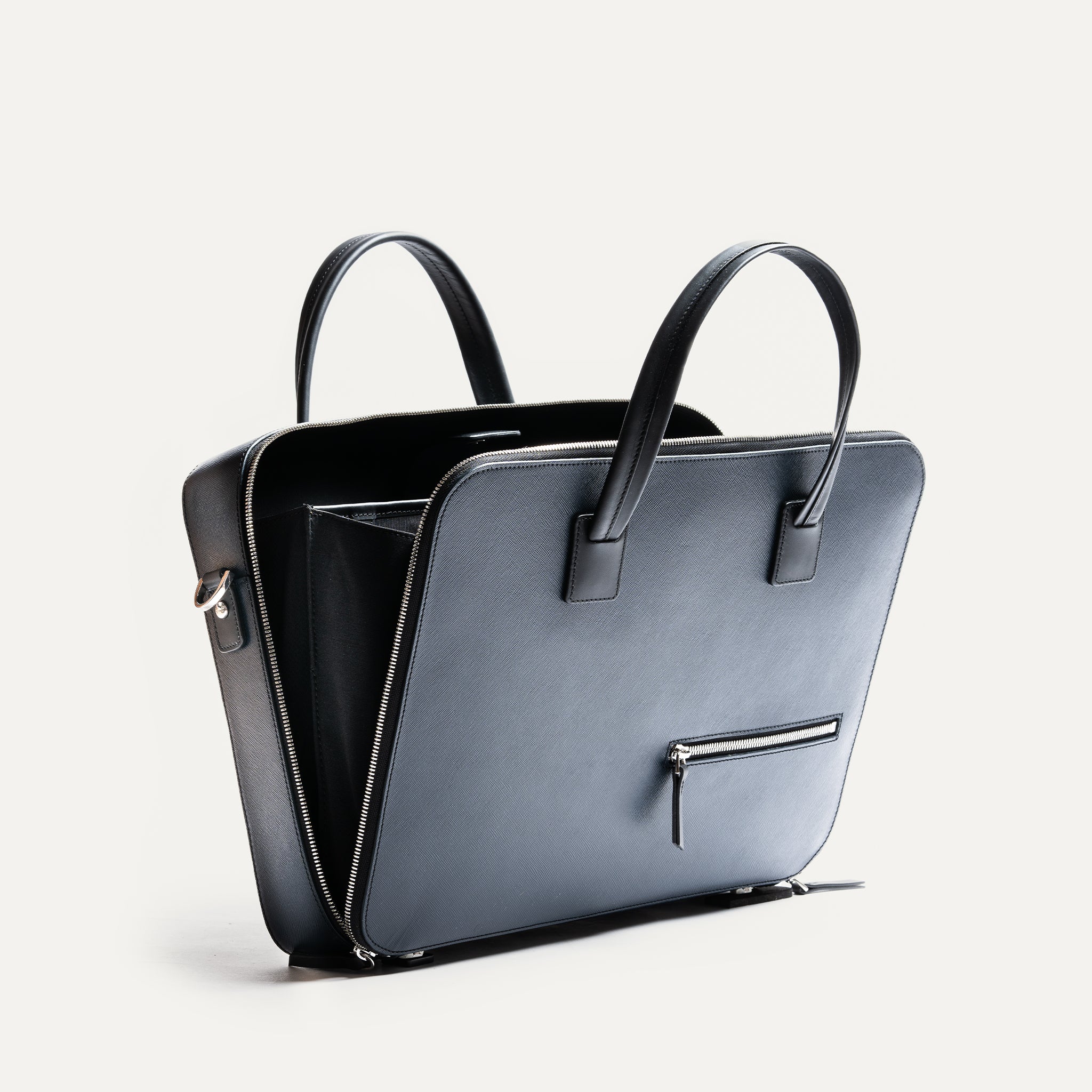 Porte document ouvert avec un compartiment pour ordinateur.