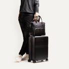 Porte-documents pour ordinateur, élégant et fonctionnel, qui se fixe sur une valise