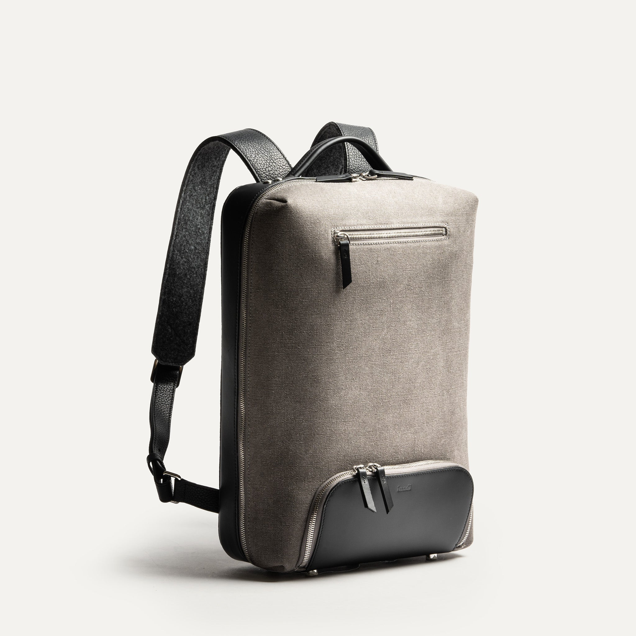 Sac à dos homme luxe toile et cuir, parfait pour le travail et les déplacements avec ordinateur.