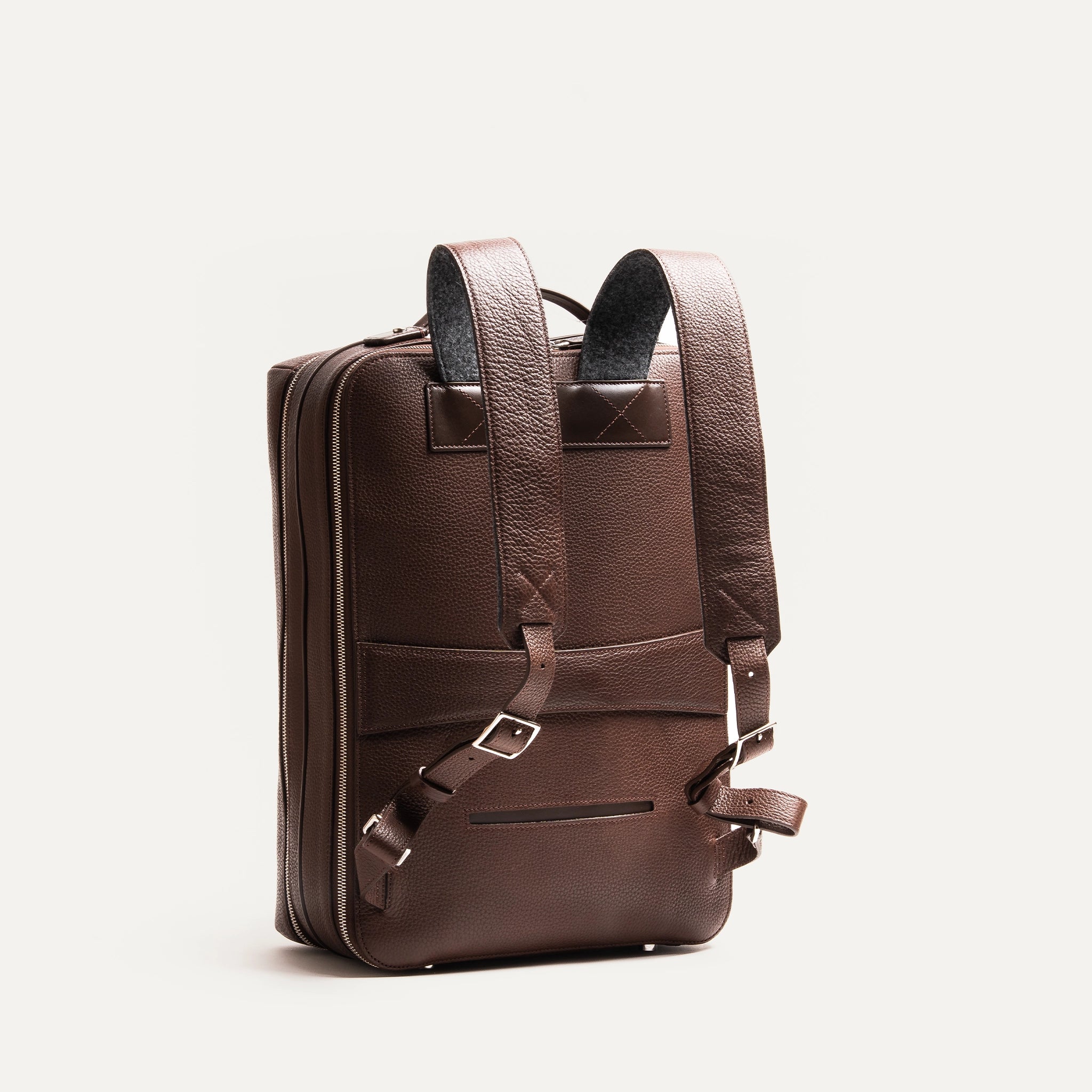 Sac à dos en cuir équipé d'une sangle valise de la marque lundi