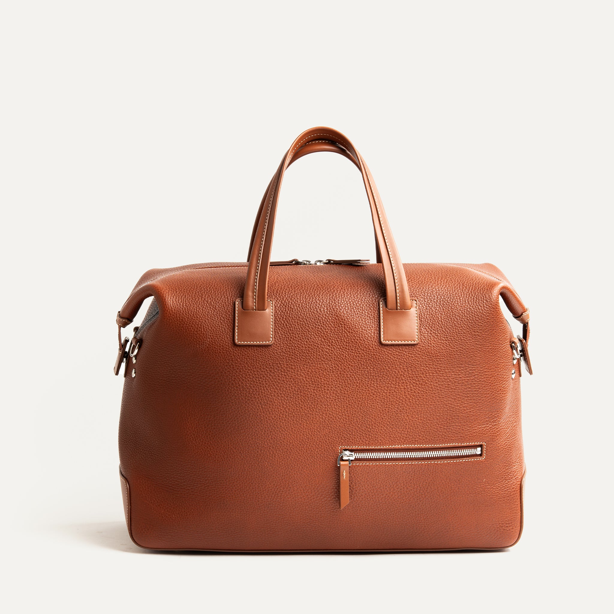 Sac week-end pour homme et femme en cuir marron, élégant et pratique pour courts séjours.