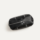 Sac weekender en cuir noir fermeture éclair renforcée, idéal courts séjours et déplacements professionnels.