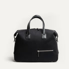 Sac week end pour homme en toile noir et en cuir grainé semi-végétal.