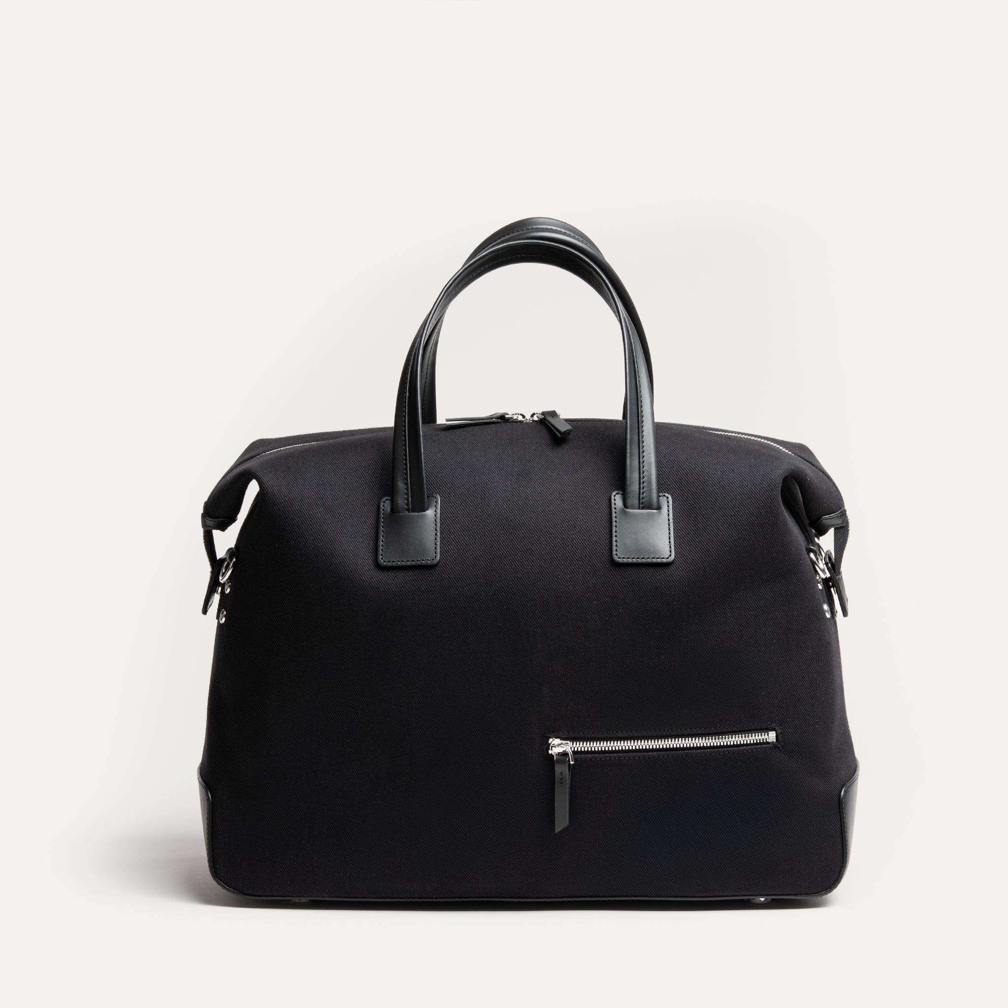 Sac week end pour homme en toile noir et en cuir grainé semi-végétal.