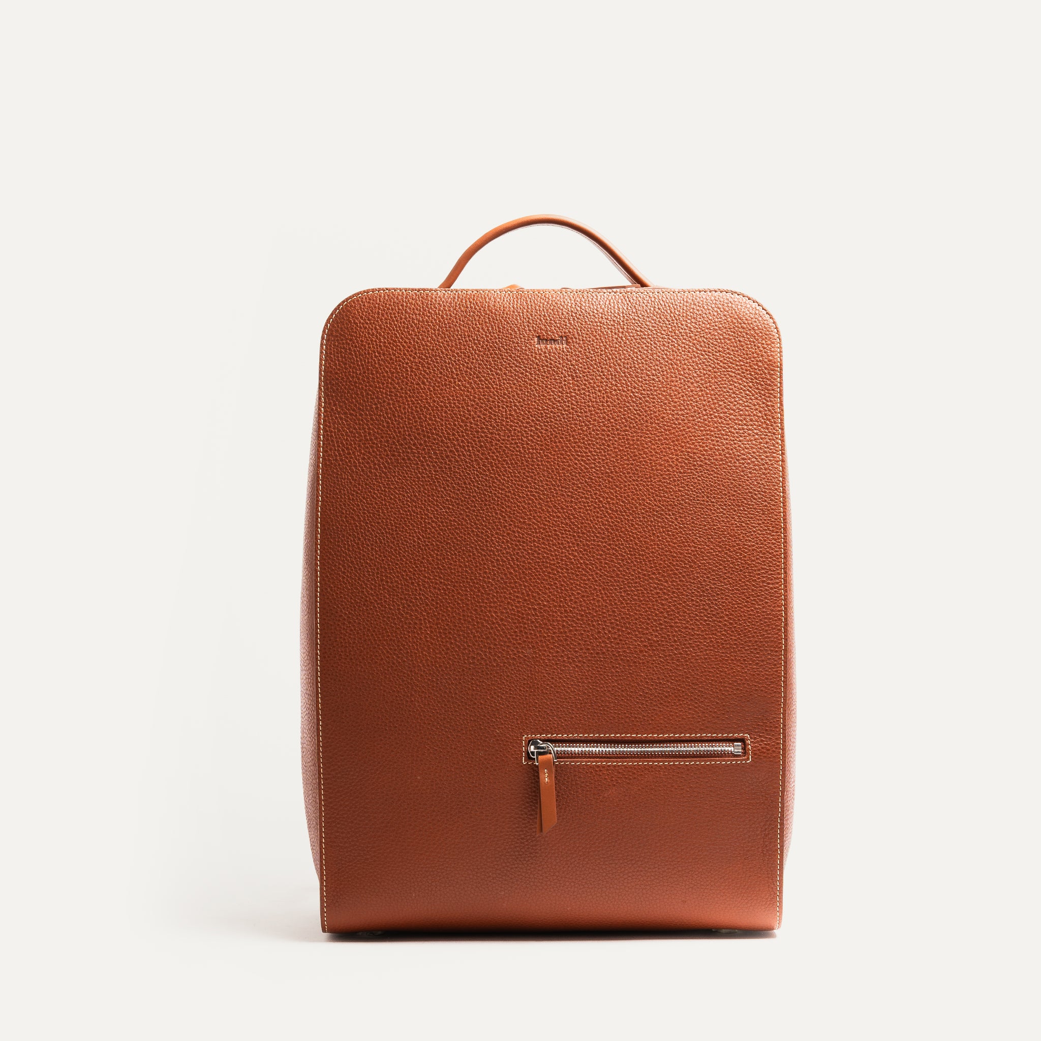 sac à dos en cuir homme cognac pensé par lundi.