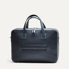 Sac à main homme TILIO II avec double zip et détails métalliques en laiton haut de gamme.