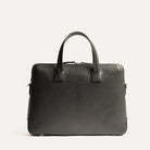 Dos du sac à bandoulière homme en cuir noir, design sobre et ergonomique pour le quotidien.