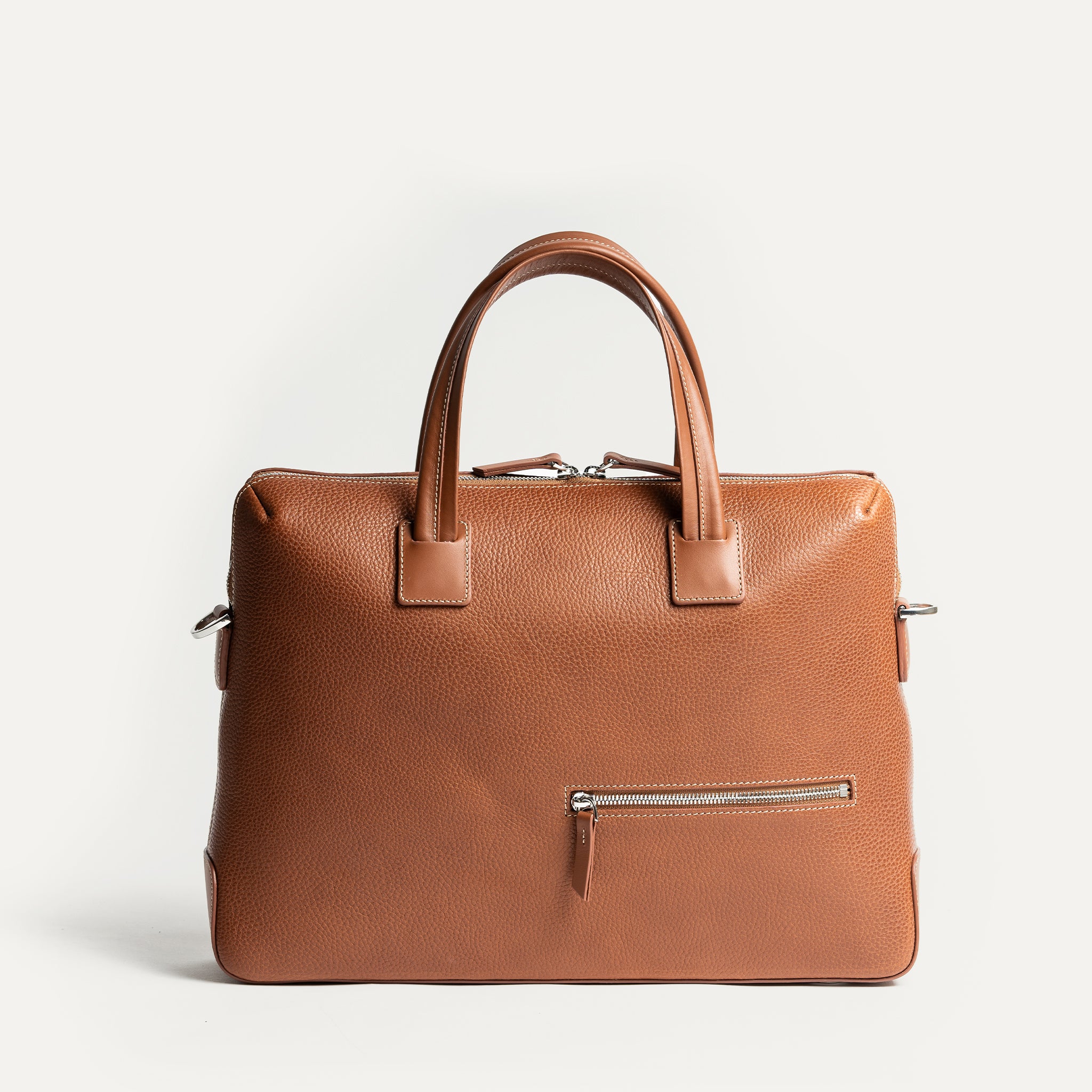 Sac à bandoulière homme convertible en porte-document raffiné, coloris cognac.