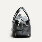 Sac de voyage en cuir pleine fleur grainé noir de 26 cm de largeur.