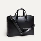 Sac cuir homme durable avec compartiment matelassé central et organisation pensée pour les journées bien remplies.