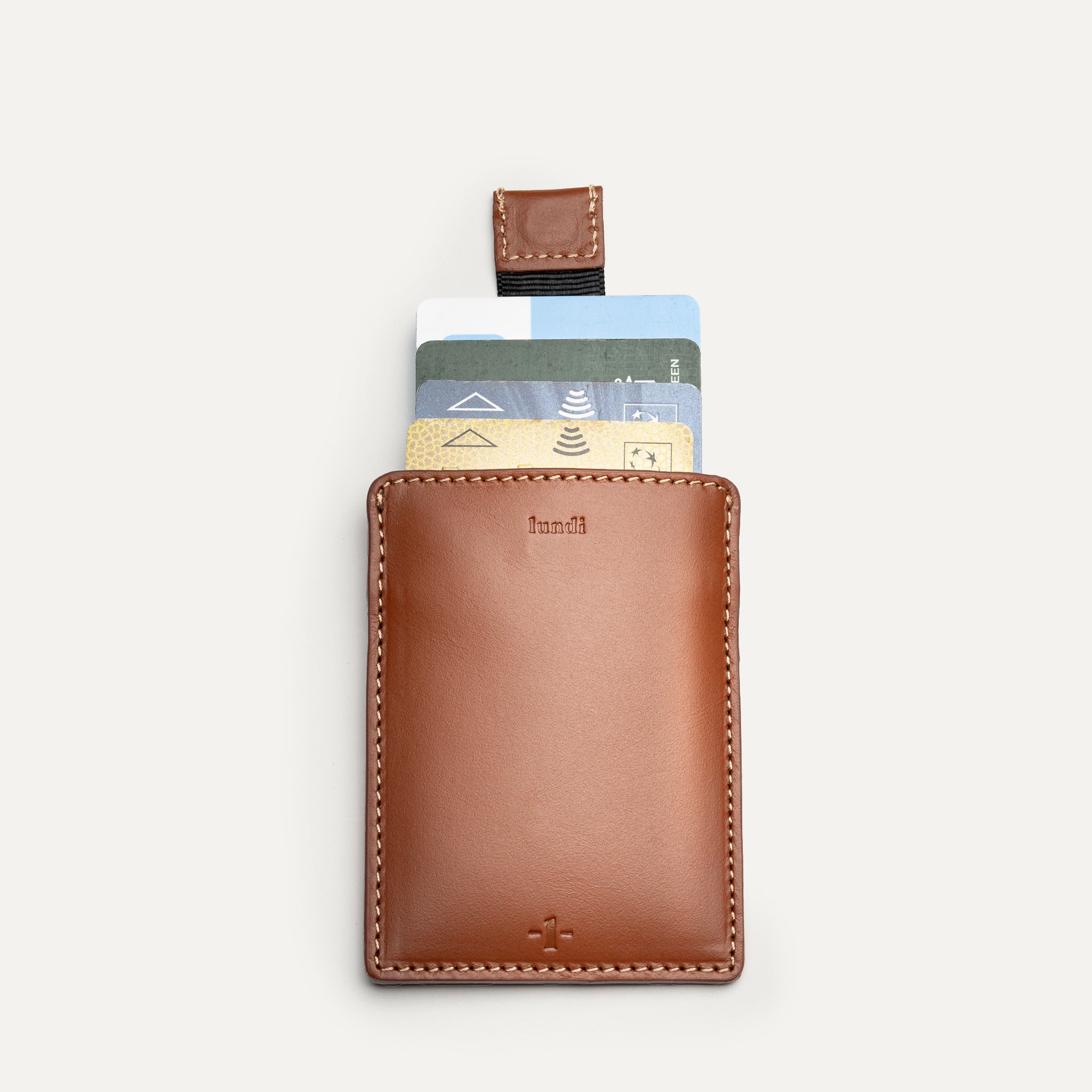 Porte carte en cuir cognac homme luxe avec tirette pratique pour cartes bancaires.