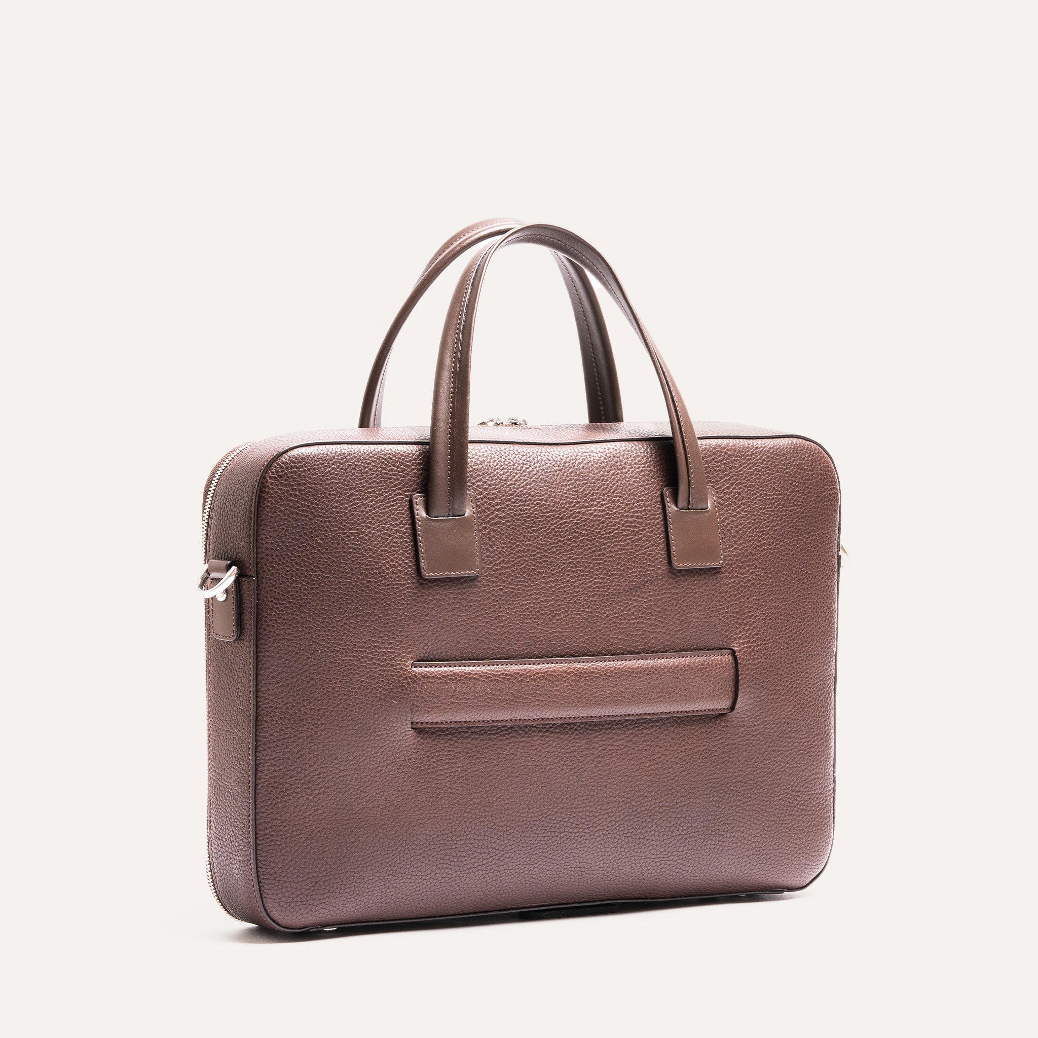 Vue arrière d’un sac homme travail avec poignées renforcées et passant pour trolley, parfait pour les voyages d'affaires.