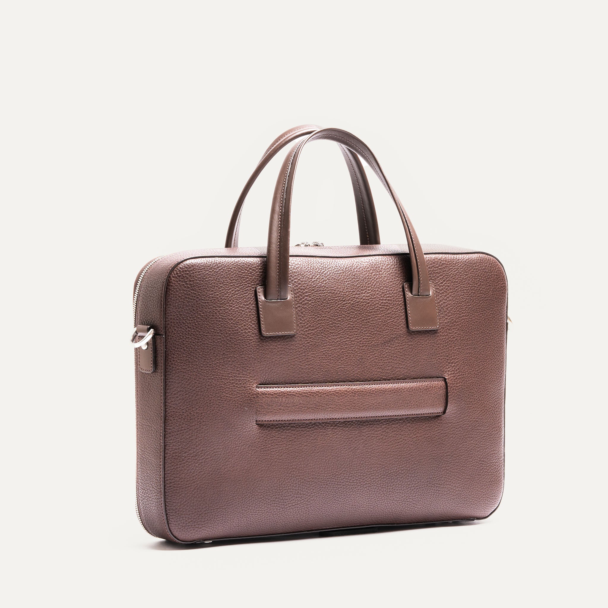 Vue arrière d’un sac homme travail avec poignées renforcées et passant pour trolley, parfait pour les voyages d'affaires.