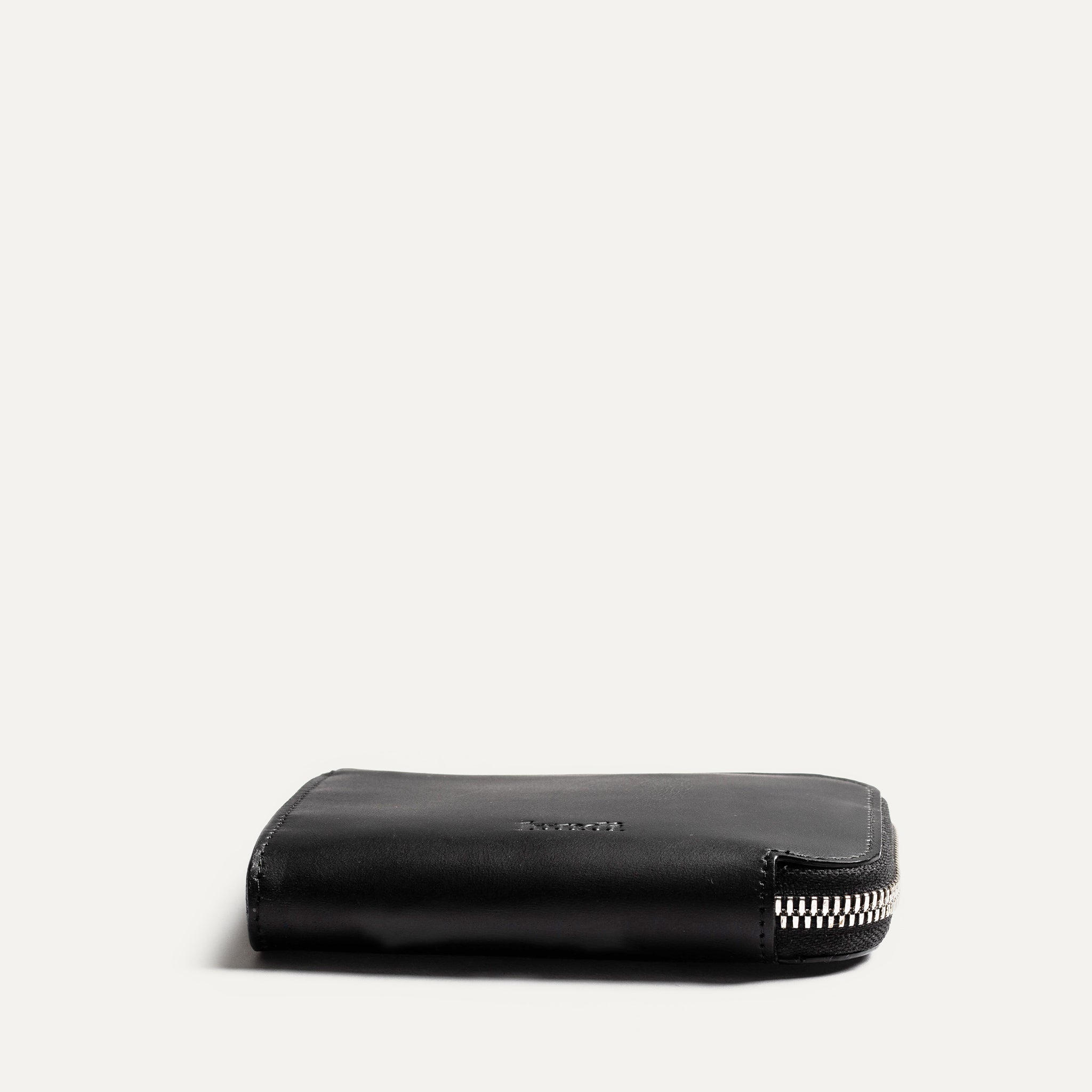 Portefeuille homme cuir lundi - modèle CHARLES en cuir noir semi végétal durable.