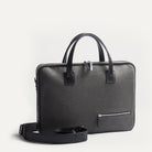 Briefcase élégant et minimaliste de la marque Lundi, pensé pour l’homme actif avec des finitions haut de gamme et une bandoulière amovible.