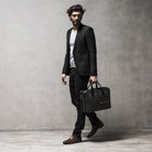 Sac à main homme CONALLY avec finitions en cuir pleine fleur et toile de coton.