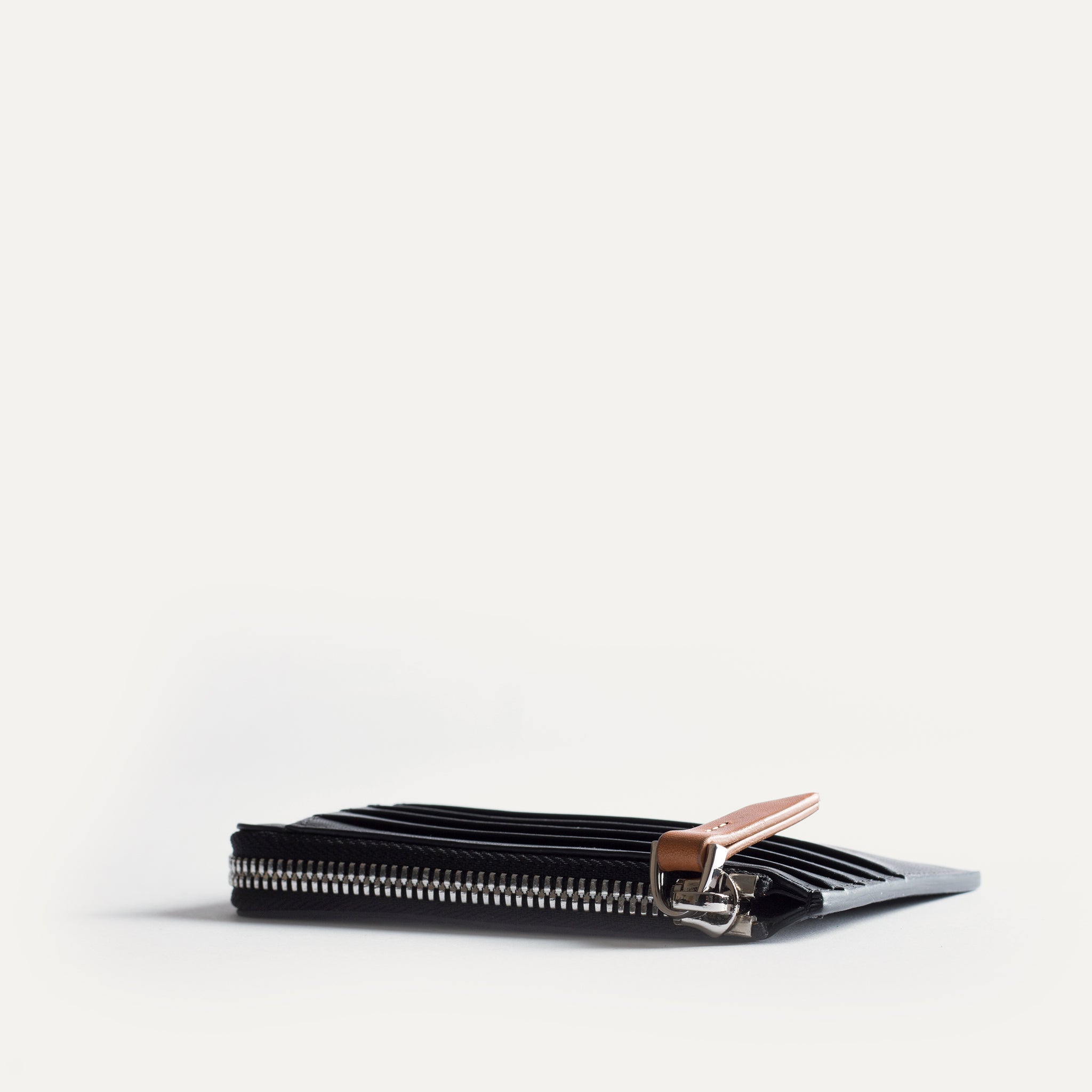 Portefeuille homme cuir noir et cognac - look chic - et fonctionnalité pratique