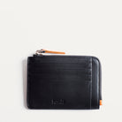 Portefeuille homme en cuir noir et au détail cognac - look élégant - fonctionnalité pratique.