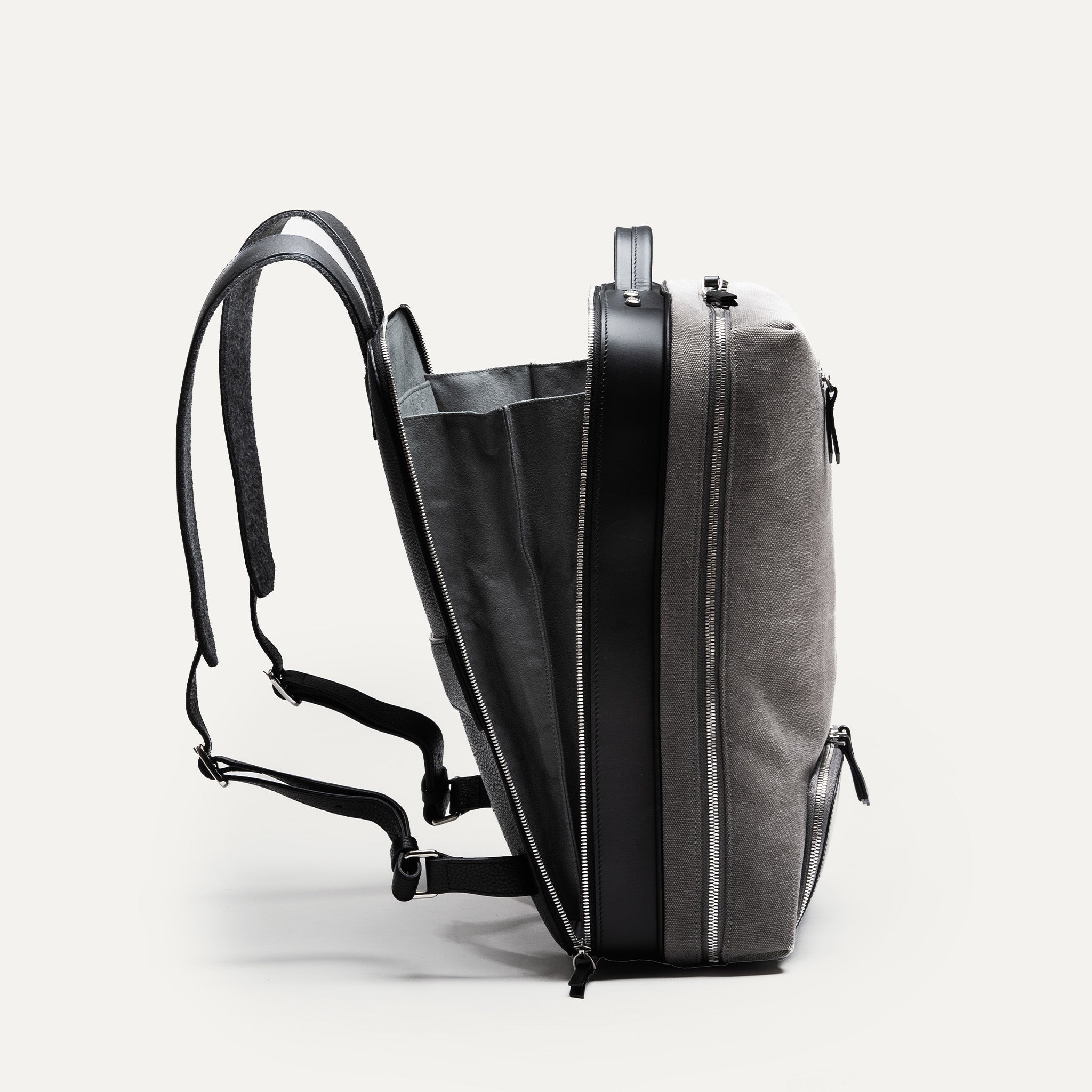 Leather and canvas travel backpack for clothes and computer | lundi