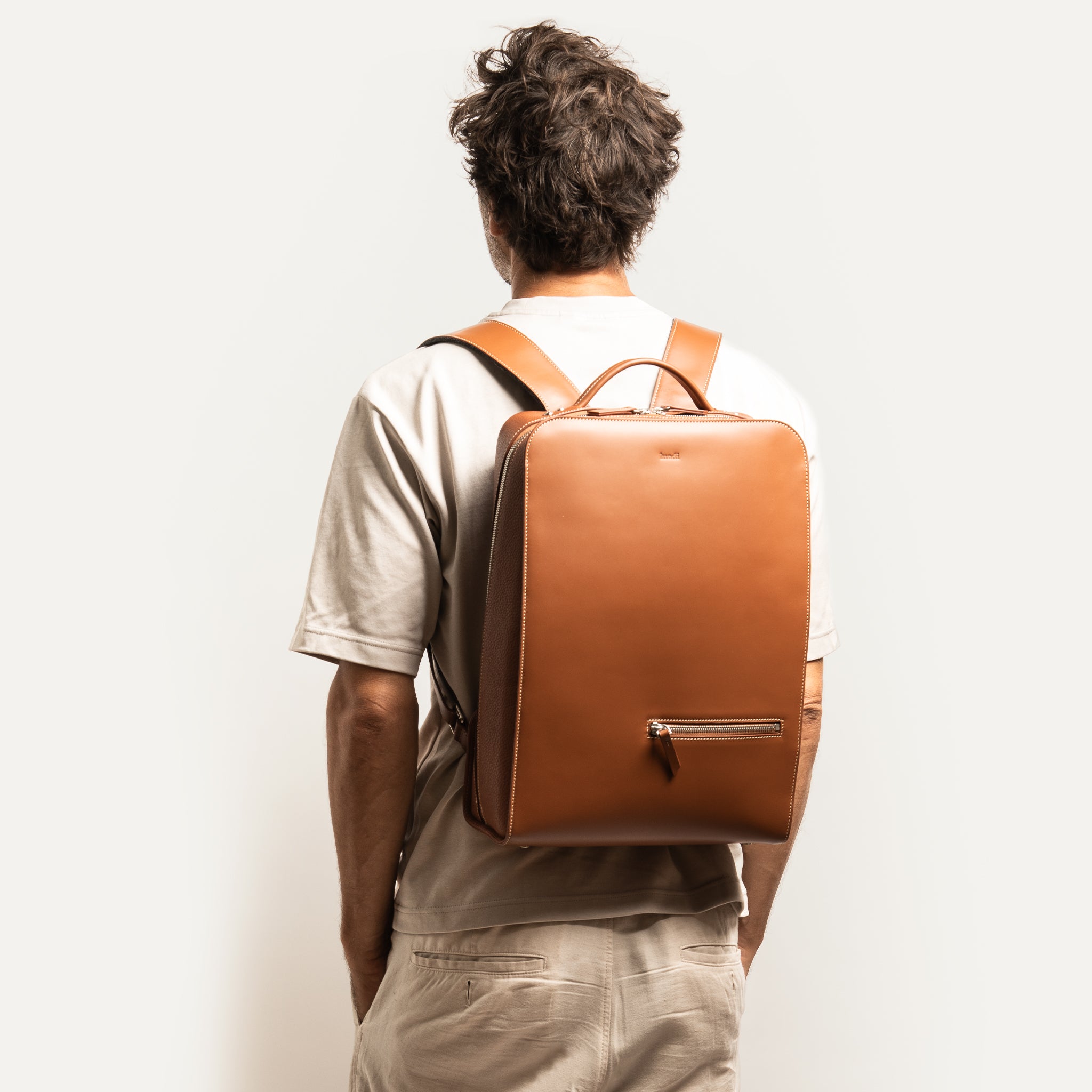 Men's cognac leather backpack