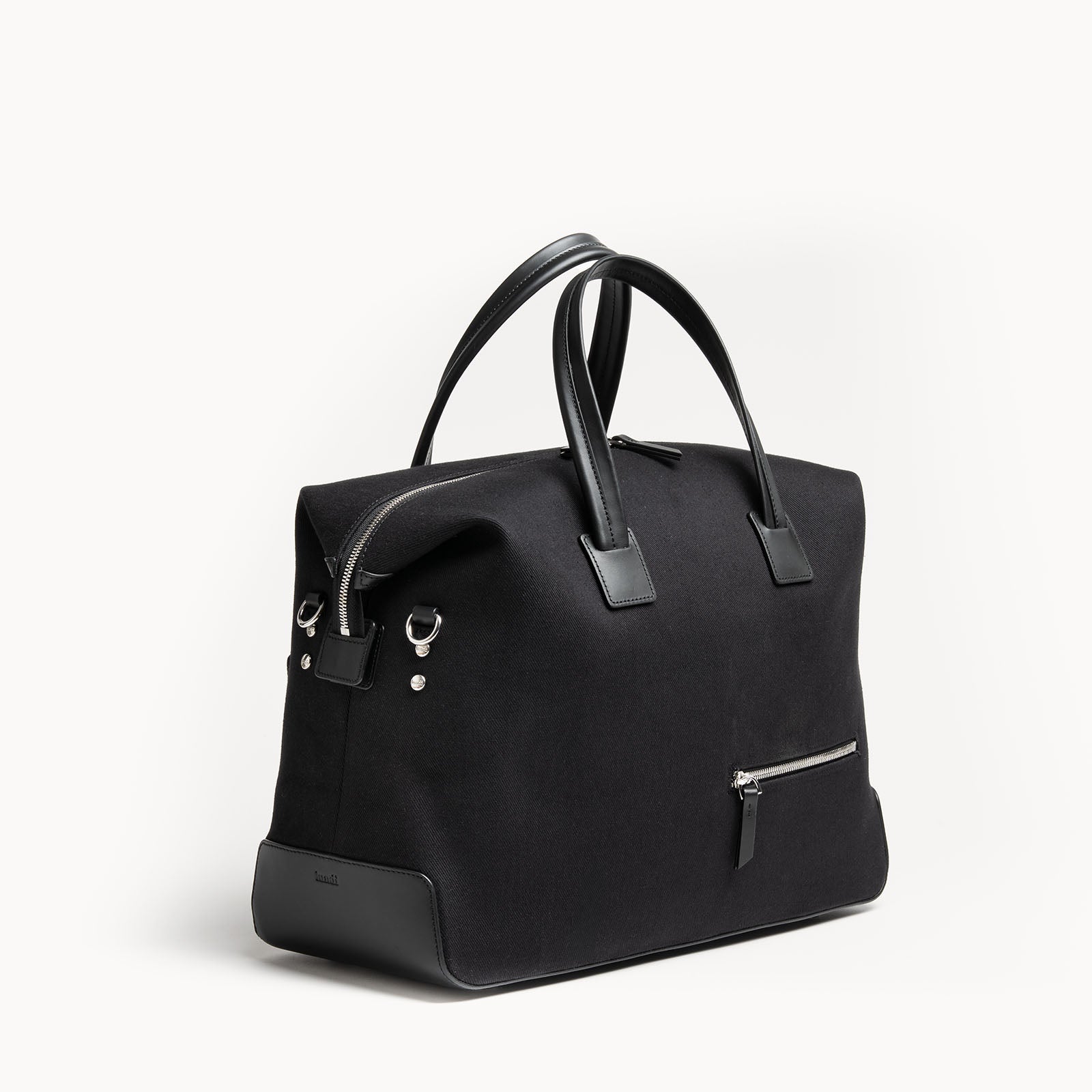 Sac week end femme en toile et cuir noir grainé semi-végétal.